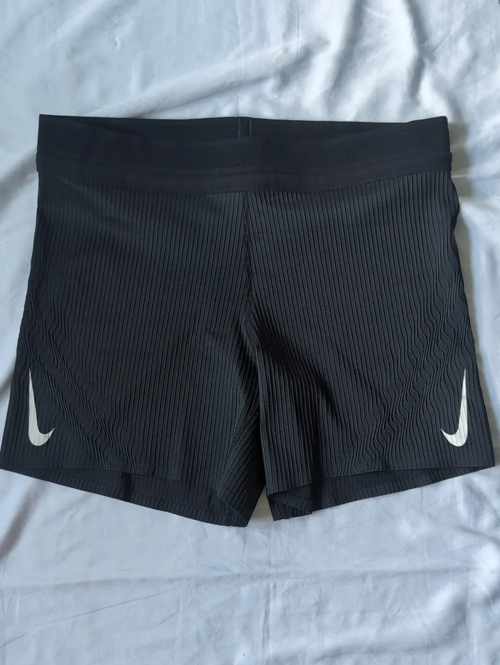 Nike Women’s Black Textured Athletic Shorts with White Swooshes